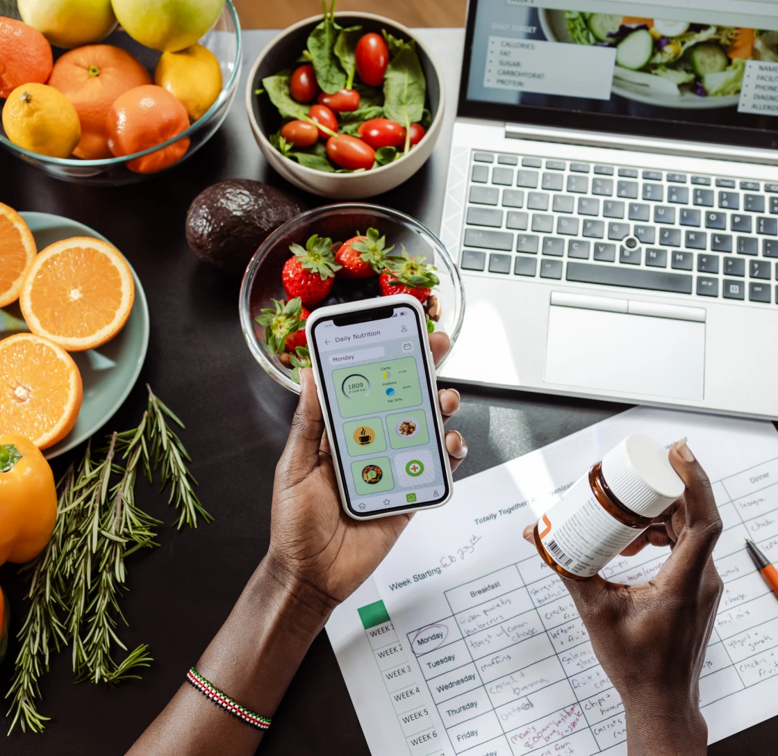 Fruits and laptop on a table